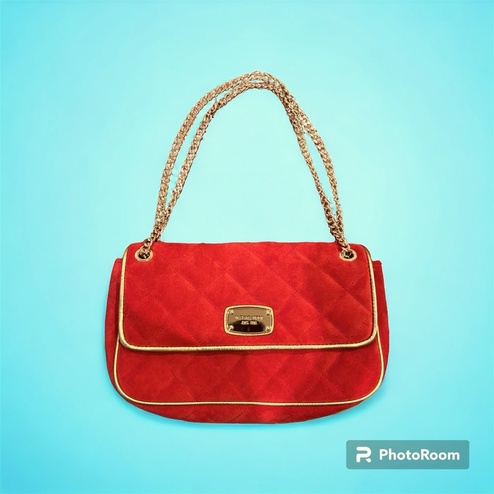 Michael Kors bright orange suede bag. no signs of use.
